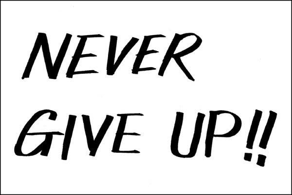 黒﨑さん直筆。座右の銘は、「Never Give Up」