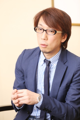 グランドデザイン代表の小川和也さん。「ビジネスで優秀な人材が海外に流出してしまうのを真剣に問わなければならない時期です」