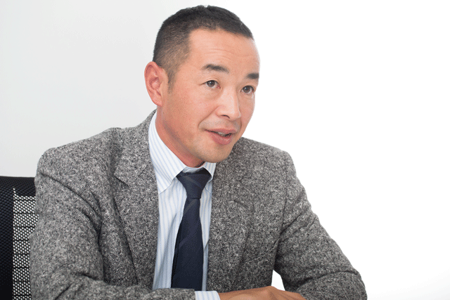 ポリコムジャパンのマーケティング部でパートナーマーケティングマネージャーを務める横山大介さん
